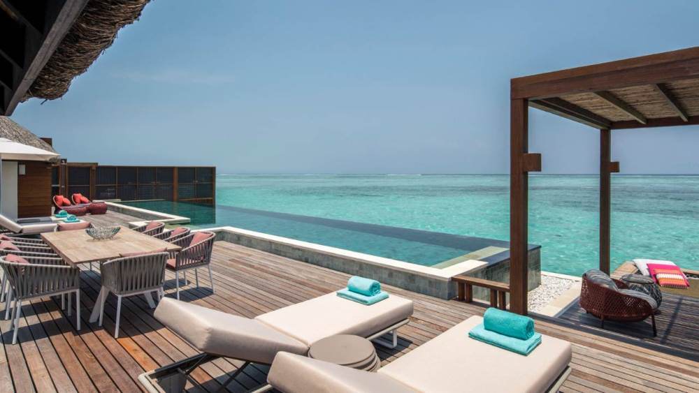 content/hotel/Four Seasons Kuda Huraa/Accommodation/Sunrise 3 Bedroom Water Suite/FSKudaHuraa-Acc-Sunrise3BWaterSuite-01.jpg